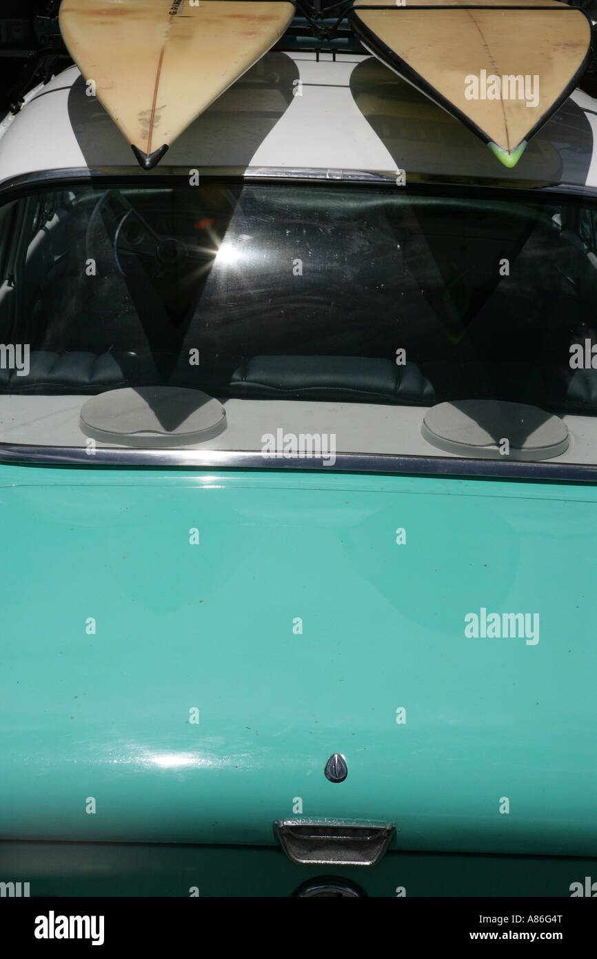 View of two surfboards on top of a car. Stock Photo