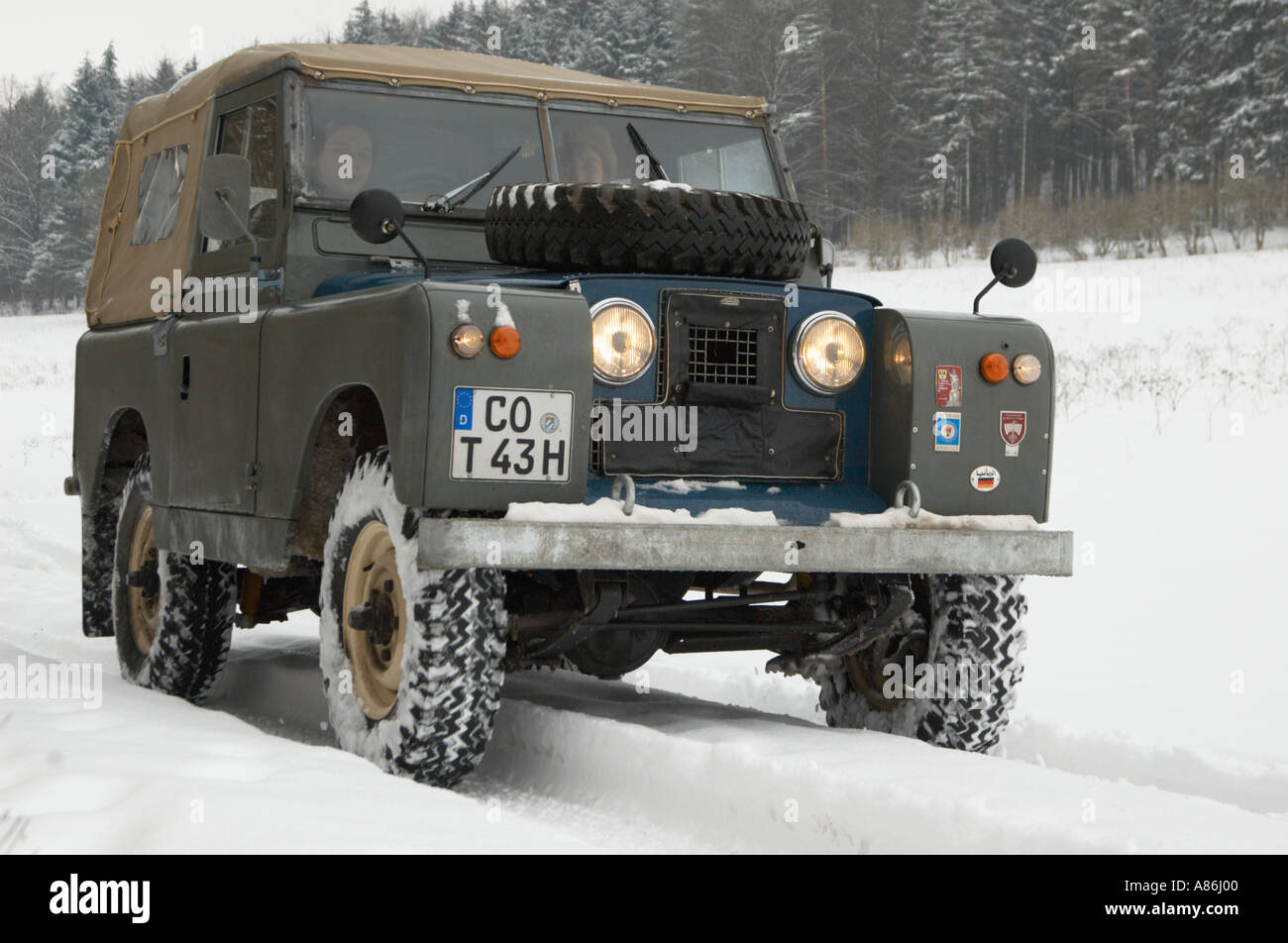 1965 Land Rover Series IIa short wheel base softtop on a winter journey through Thuringia, Germany 2005. HGW DE050091. Stock Photo
