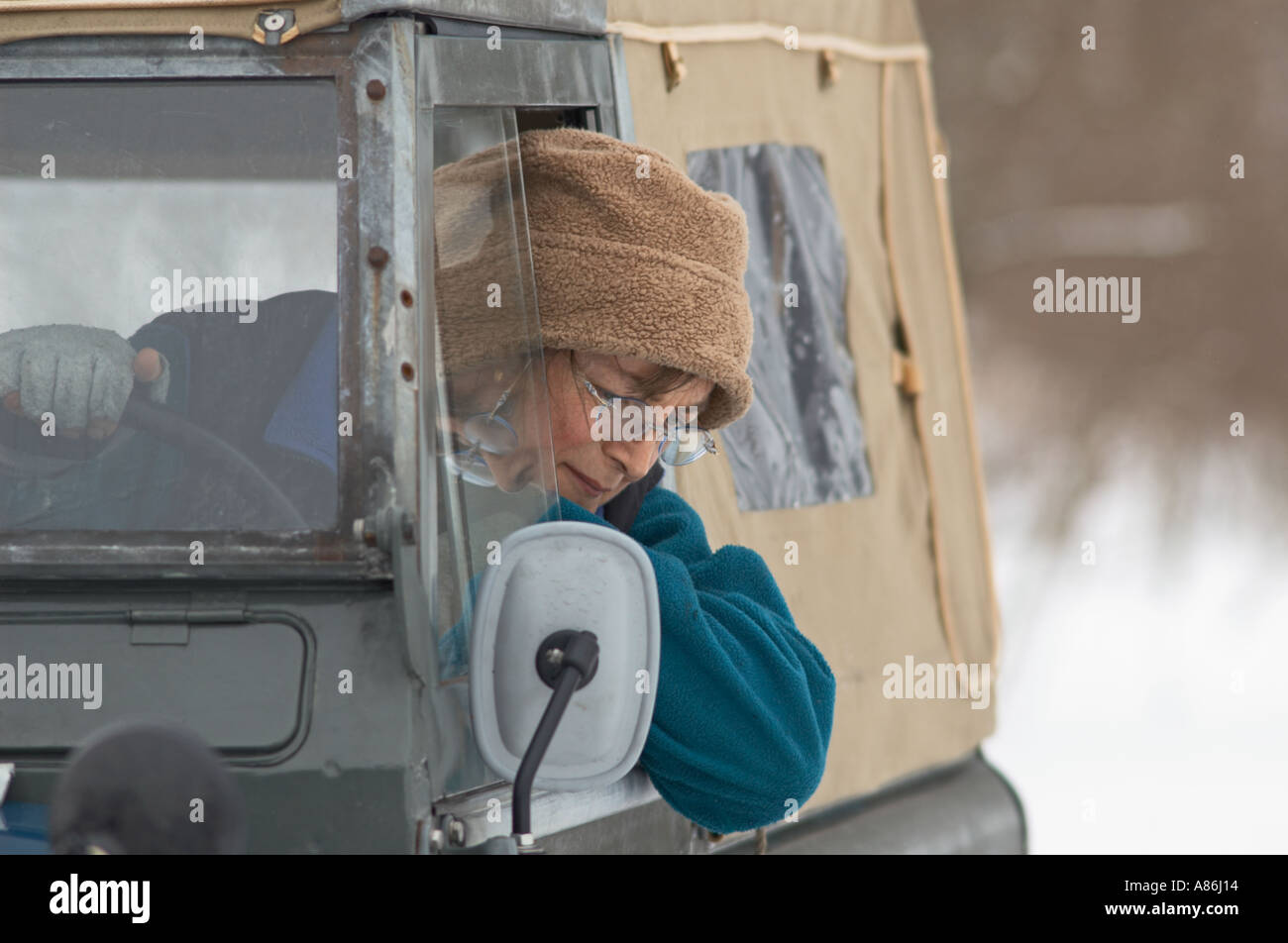 Old woman driving soft top car hires stock photography and images Alamy