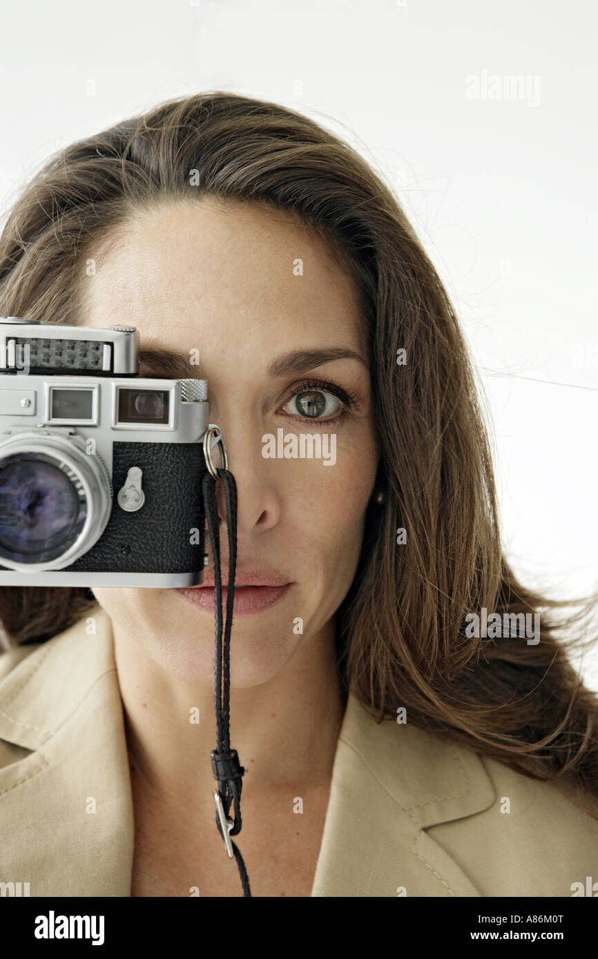 Woman taking close look hi-res stock photography and images - Alamy