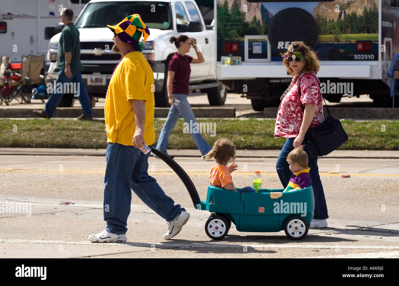 Family watching Mardi Gras parades Lafayette Louisiana LA USA Stock