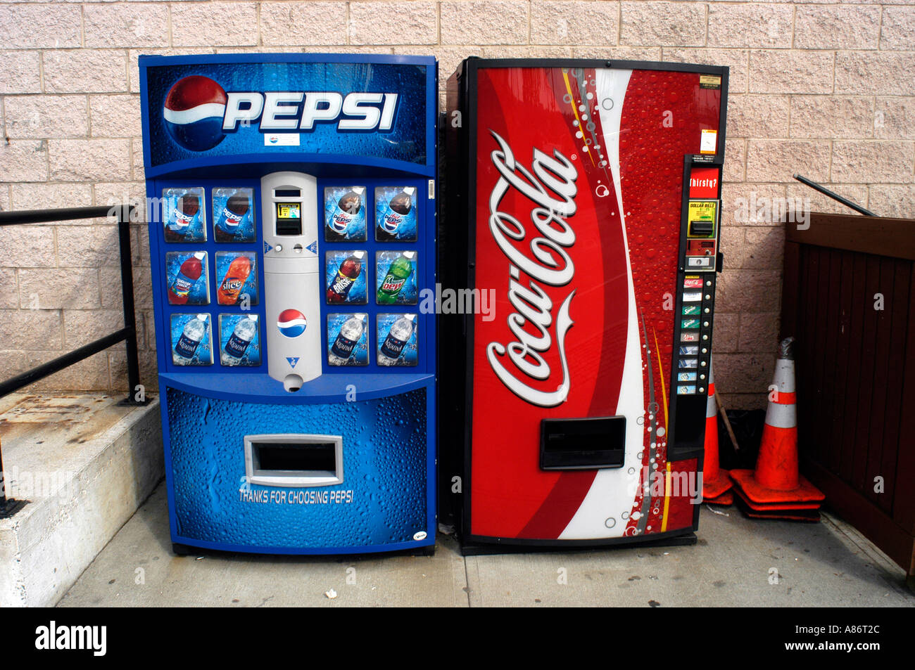 Pepsi Cola and Coca Cola vending machines side by side Stock Photo