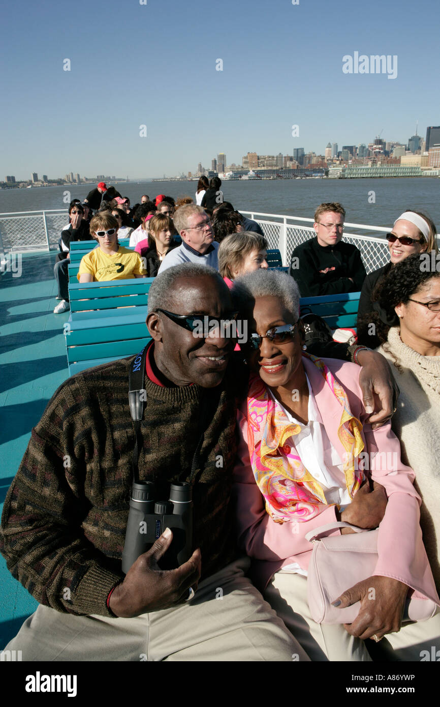Passengers on board a boat Stock Photo Alamy
