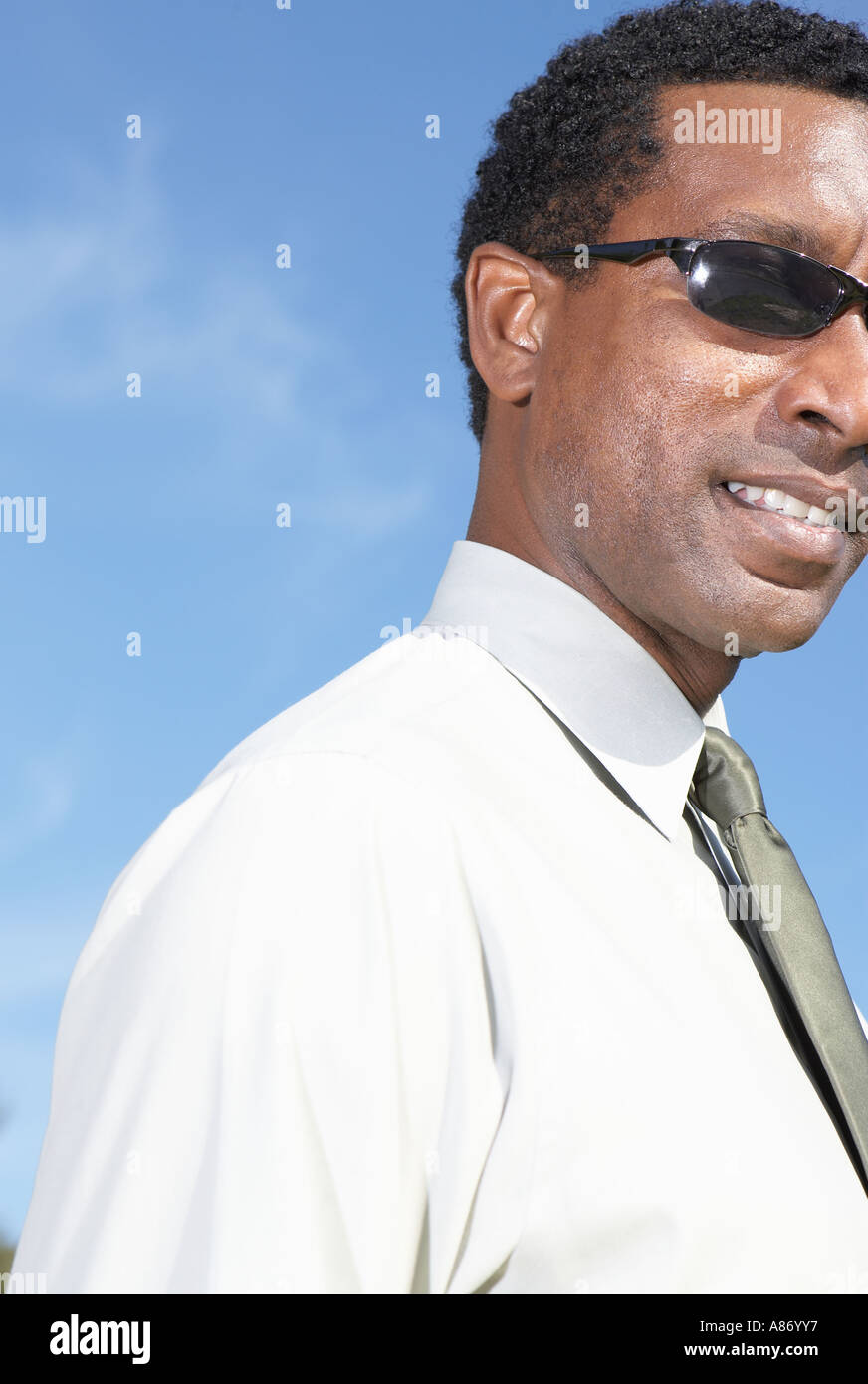 Man in glasses blue shirt hi-res stock photography and images - Alamy
