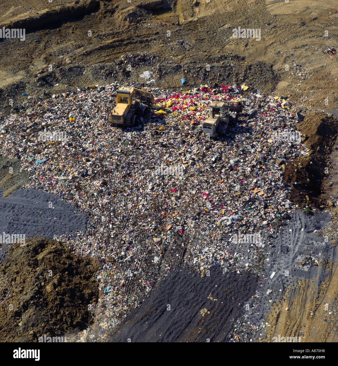 Diggers at work on landfill site UK aerial view Stock Photo 6861591