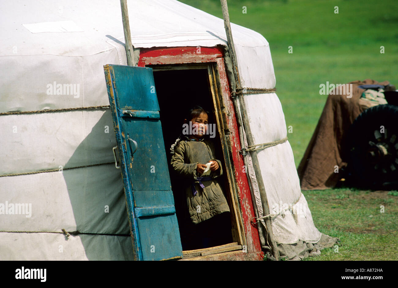 Mongolia a child in front of his Jurt door in Khoevsgoel province Stock Photo