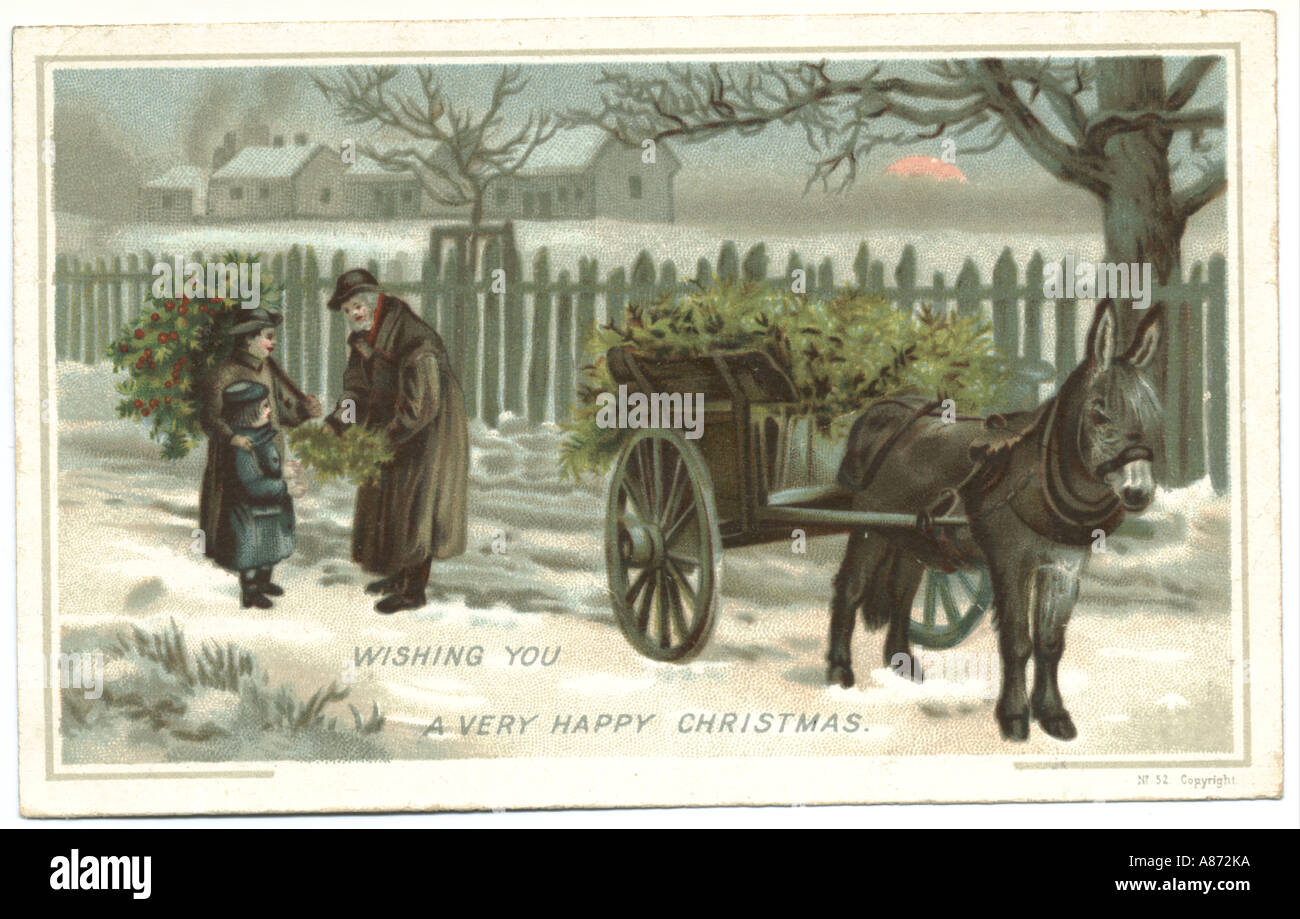 Christmas greeting card received 1887.   Elderly mistletoe seller  selling foliage to two children from his donkey cart Stock Photo