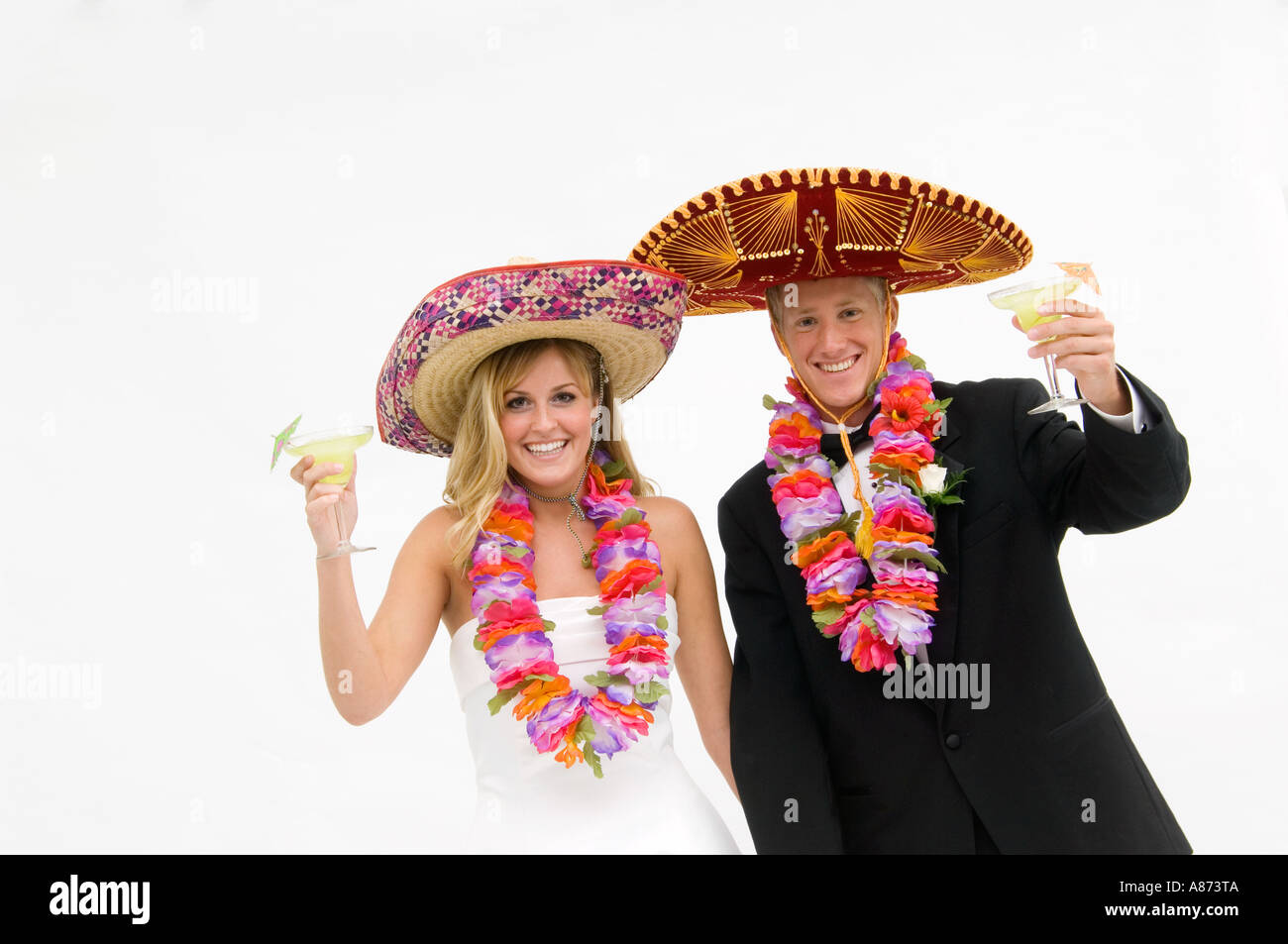 Bride and groom wearing sombreros and leis Stock Photo - Alamy