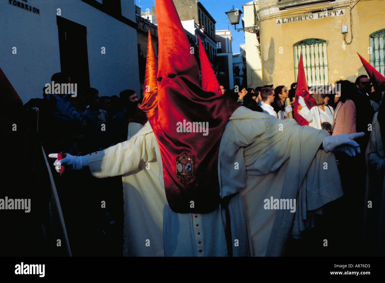 SPAIN Andalucia Seville Semana Santa Easter procession with hooded Penitent Stock Photo
