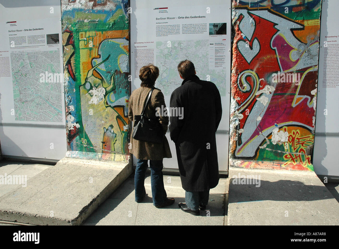 Viewing segments of the infamous Berlin Wall at Potsdamer Platz Germany Stock Photo