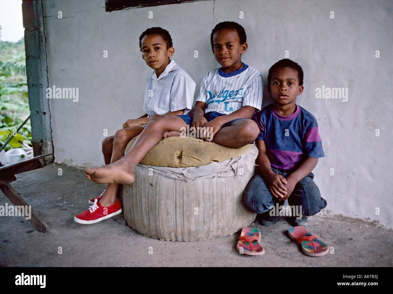 Three Dominican brothers in front of their home in central Dominican