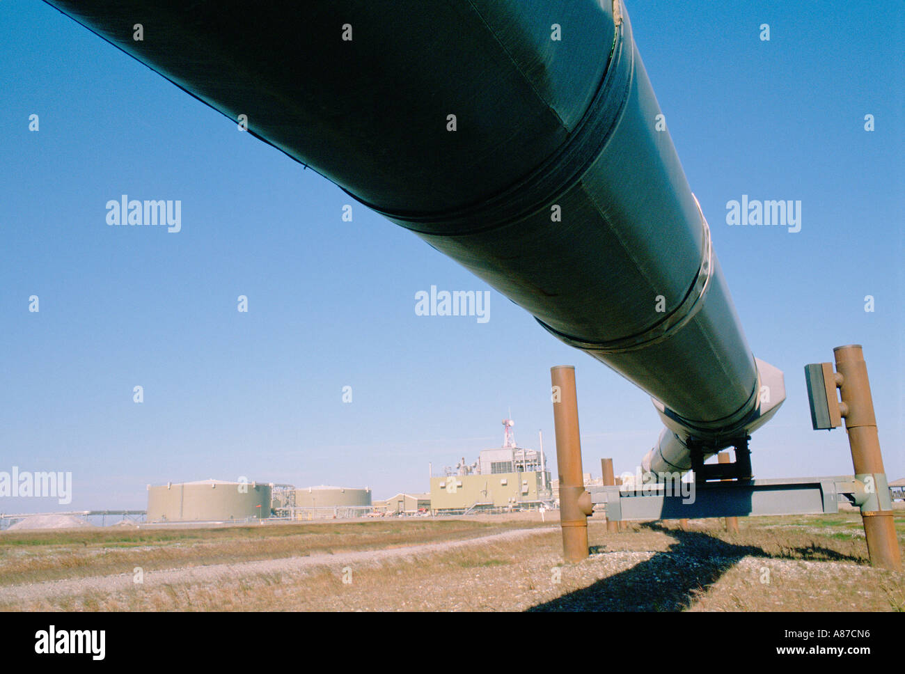 View from below of an oil pipeline in Prudhoe Bay Alaska Stock Photo