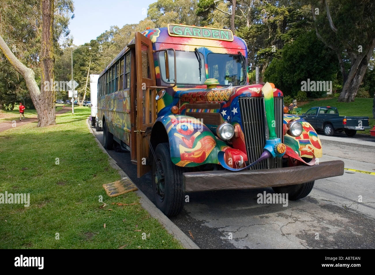 Hippie bus painted in wild psychedelic colors Stock Photo