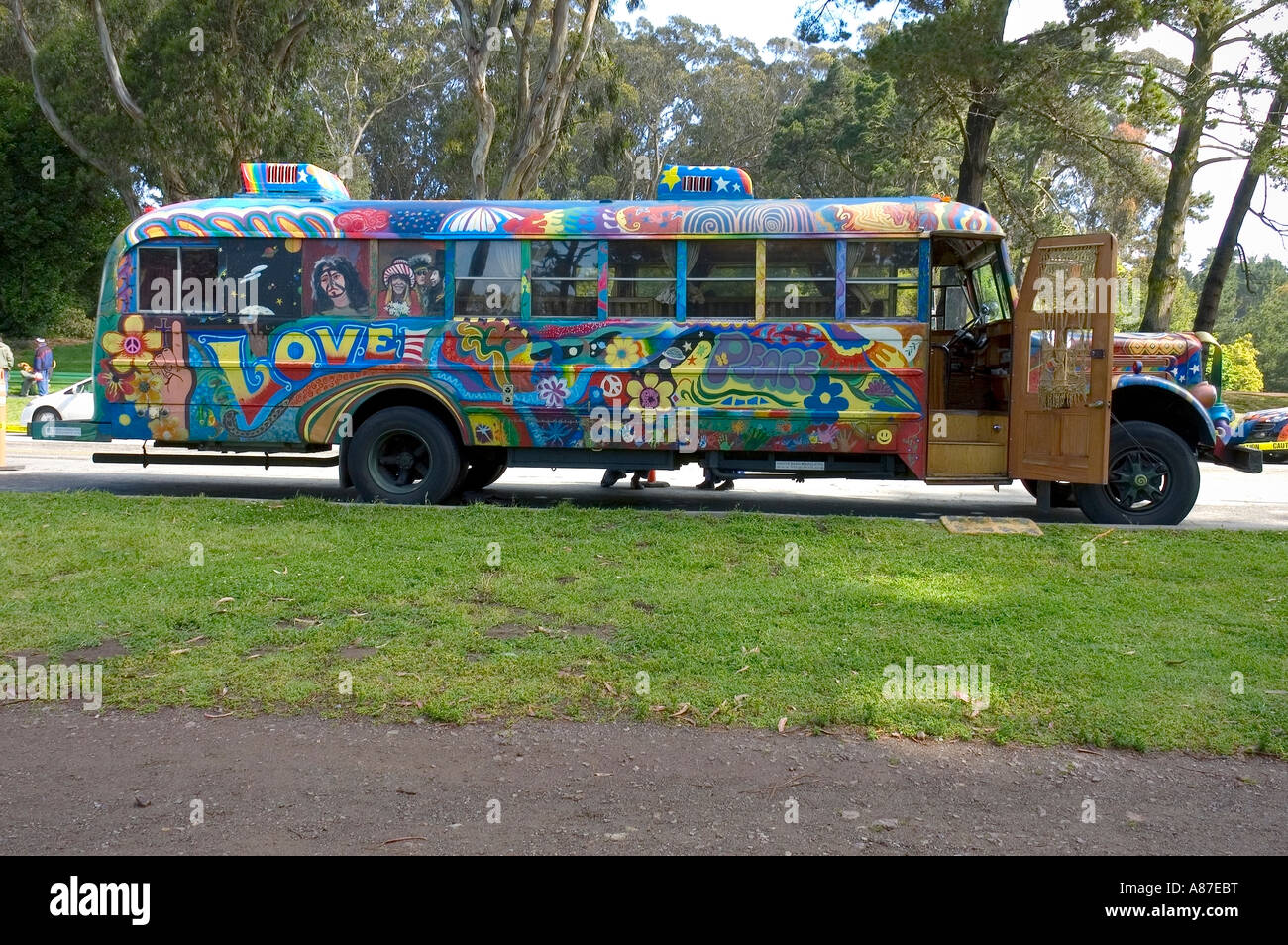 Hippie bus painted in wild psychedelic colors Stock Photo