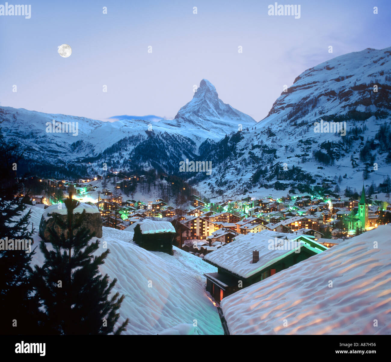 View over the resort towards the Matterhorn at dusk, Zermatt, Switzerland Stock Photo