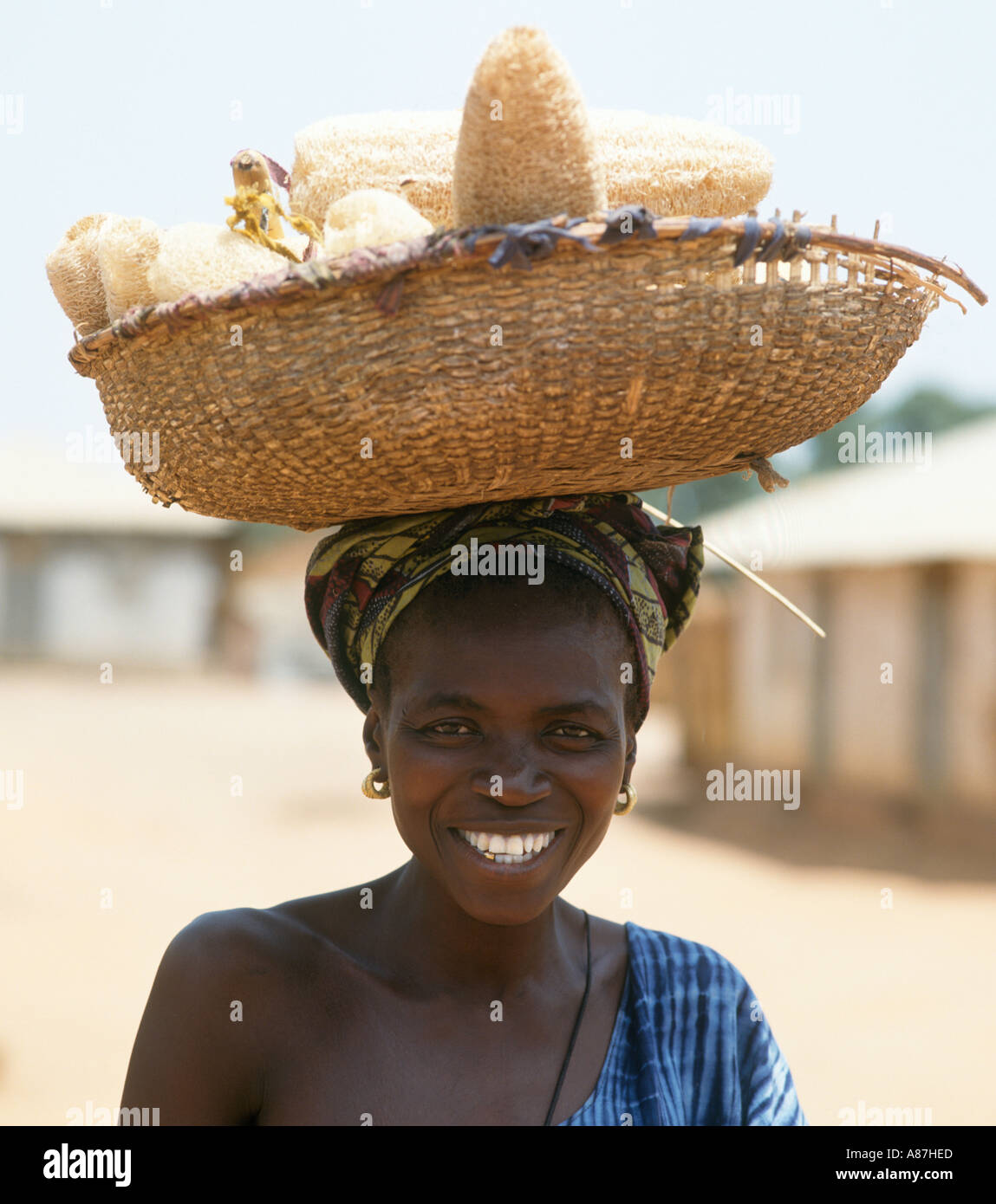 Sponge seller in the native village of Juffure (Roots Village), The Gambia,  West Africa Stock Photo - Alamy