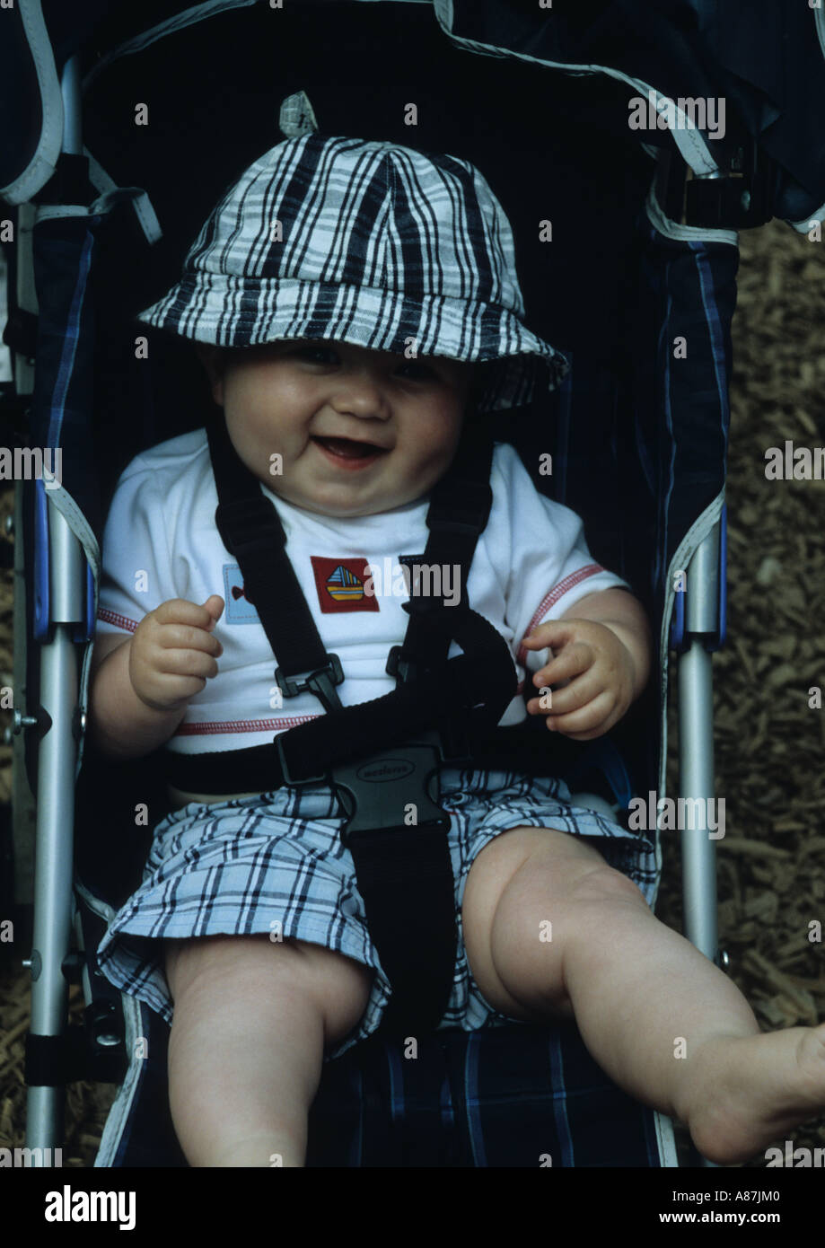 Baby in Pushchair in Norfolk Uk Stock Photo - Alamy