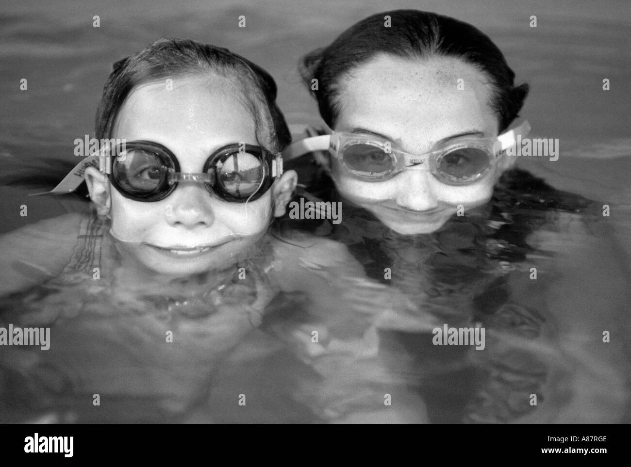 Happy friends swimming pool Black and White Stock Photos & Images - Alamy