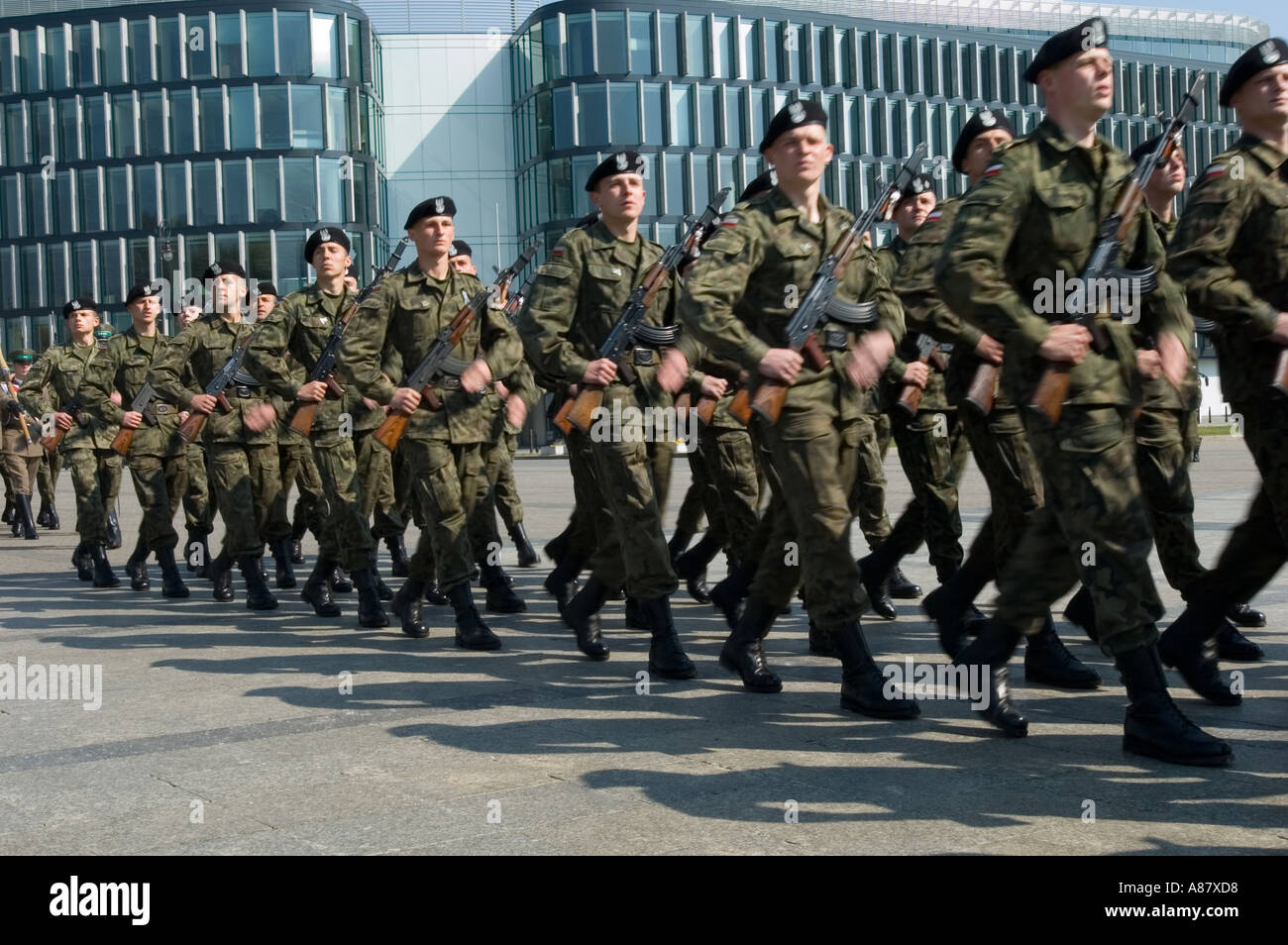 A marching group of Polish tank soldiers black hats Warsaw Poland Stock