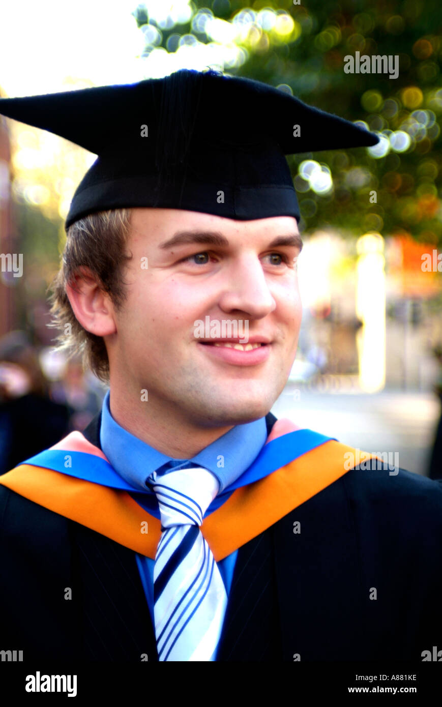 young new male graduate Stock Photo - Alamy