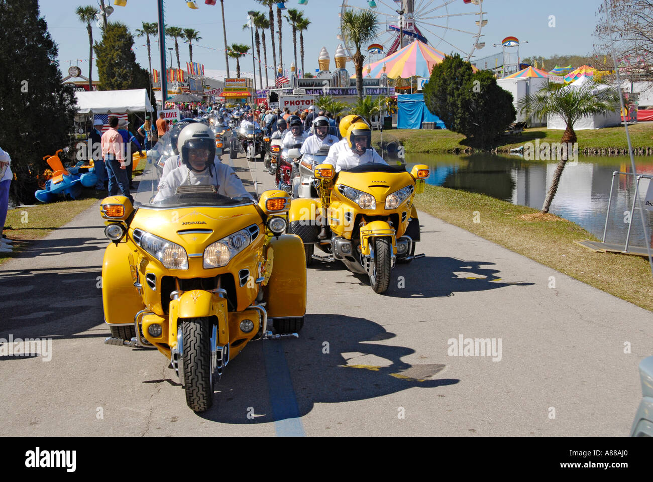 Senior men and women participate in a parade at the Florida State Fair