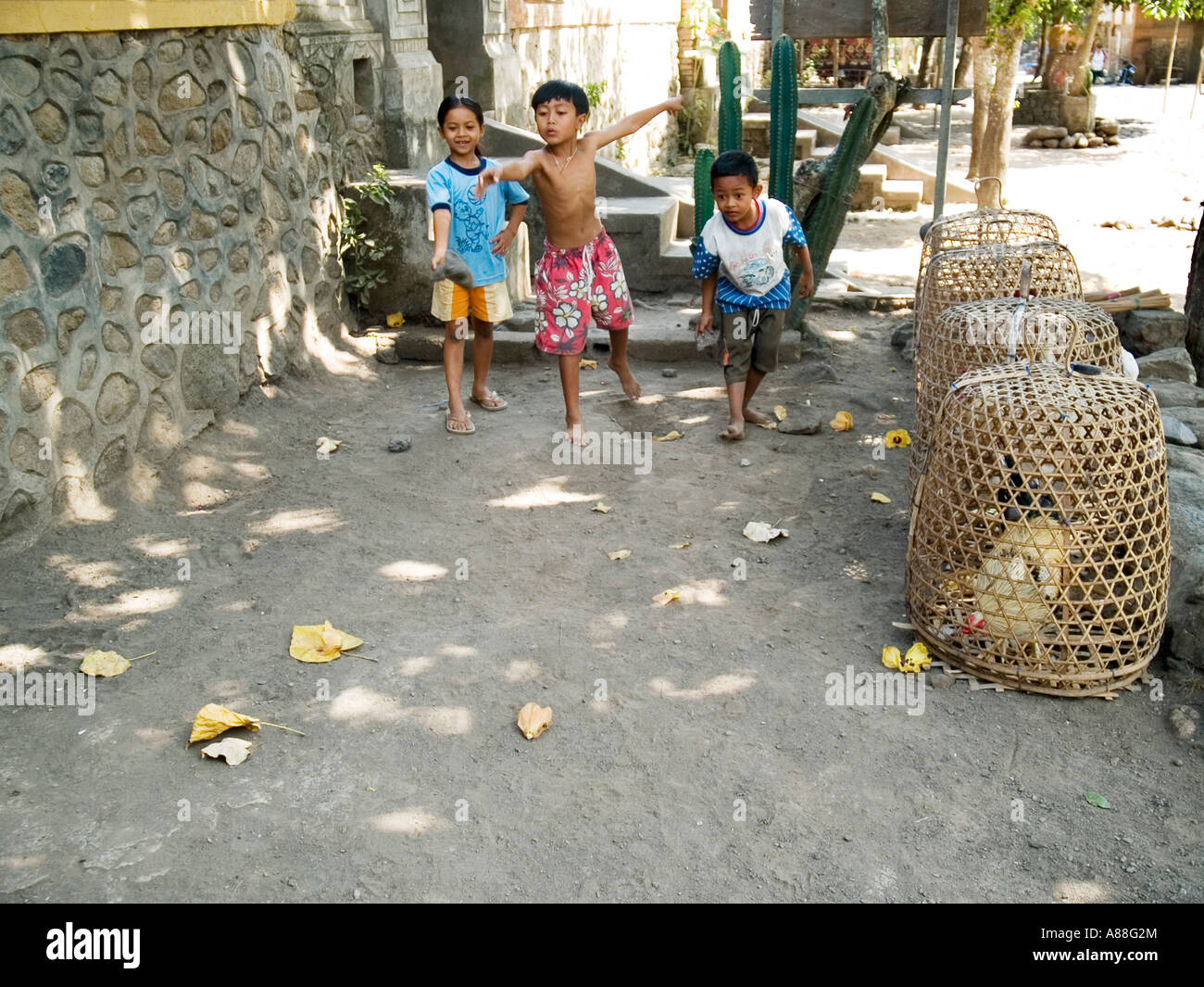 Young children throwing stones hi-res stock photography and images - Alamy