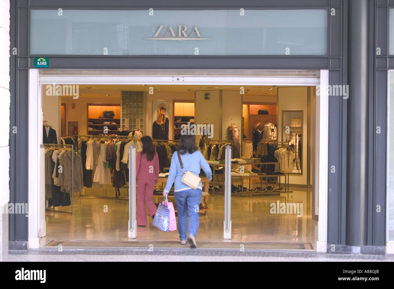 women walking into a Zara store in 