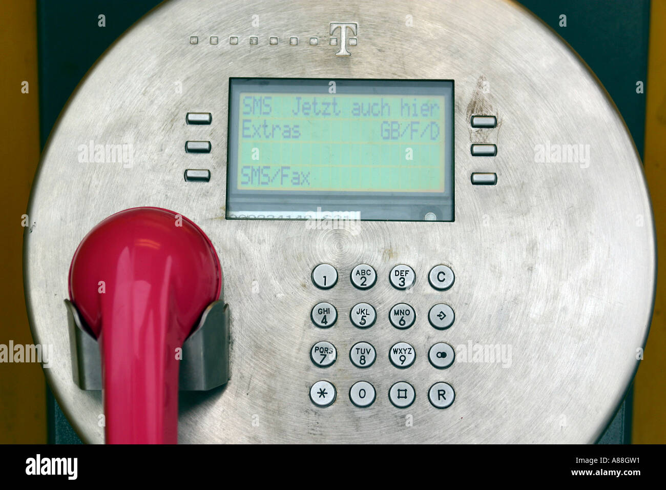 Telephone keys of a public phone of german telecom provider Deutsche Telekom are seen in Hamburg, Germany Stock Photo