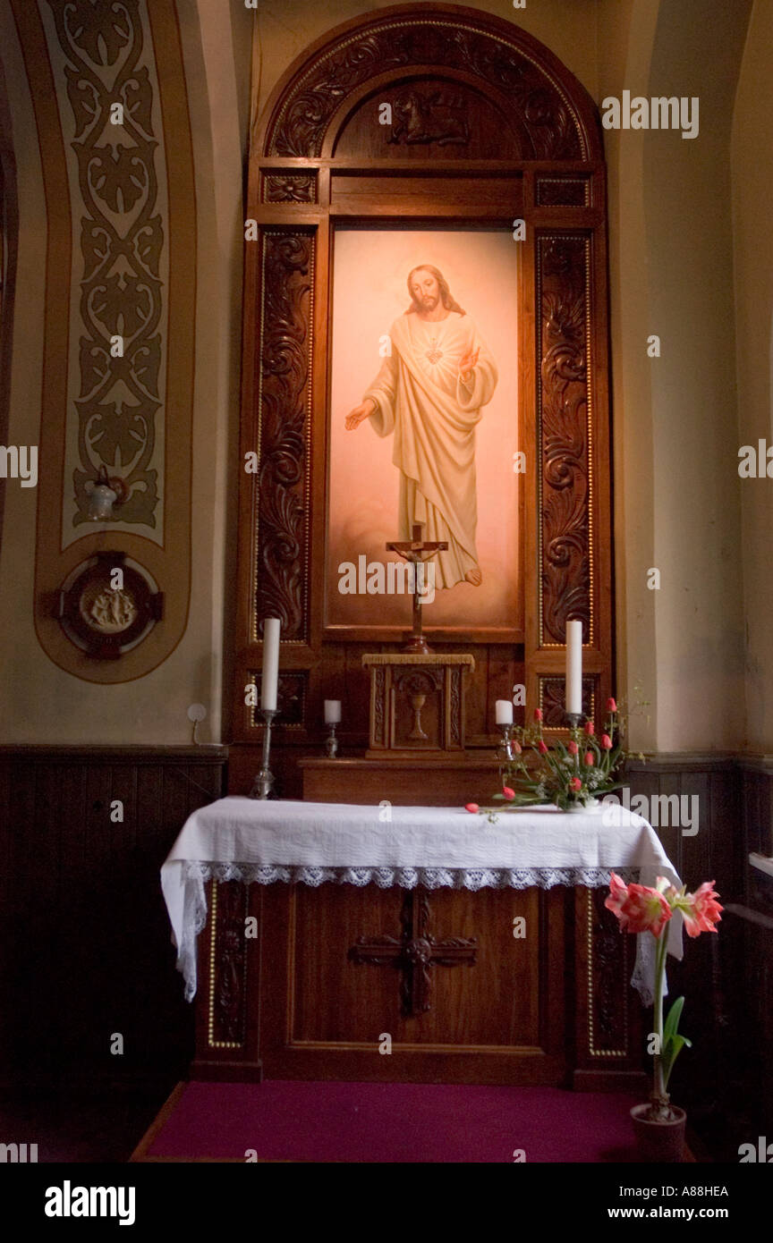 Interior of church in Riga Latvia featuring a wooden altar, painting of ...