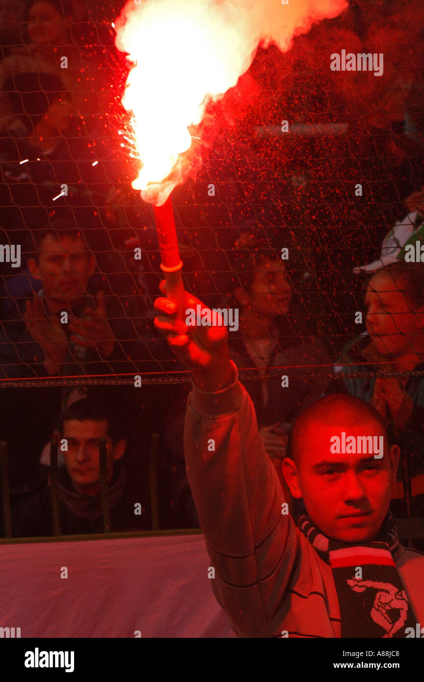 Football fans burning fire on soccer stadium Stock Photo Alamy
