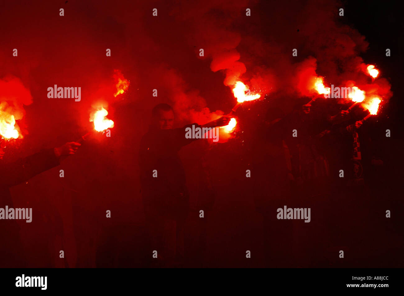 Football fans burning fire on soccer stadium Stock Photo Alamy