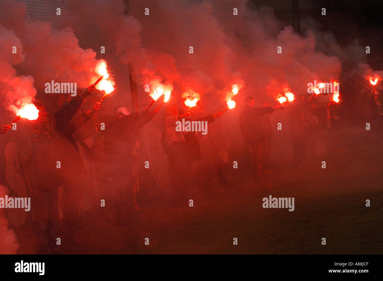Football fans burning fire on soccer stadium Stock Photo Alamy