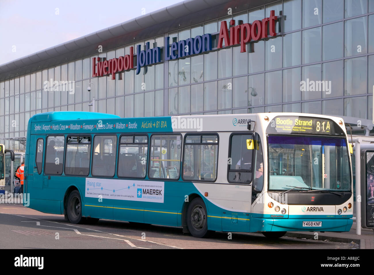 aa bus outside John Lennon airport, Liverpool, England Stock Photo