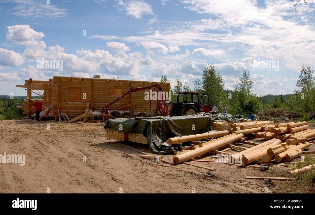 View Of Log Cabin Construction Site And Construction Materials And