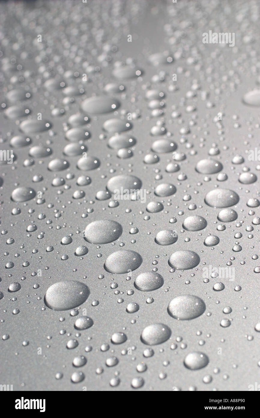 Round water drops on metal surface Stock Photo