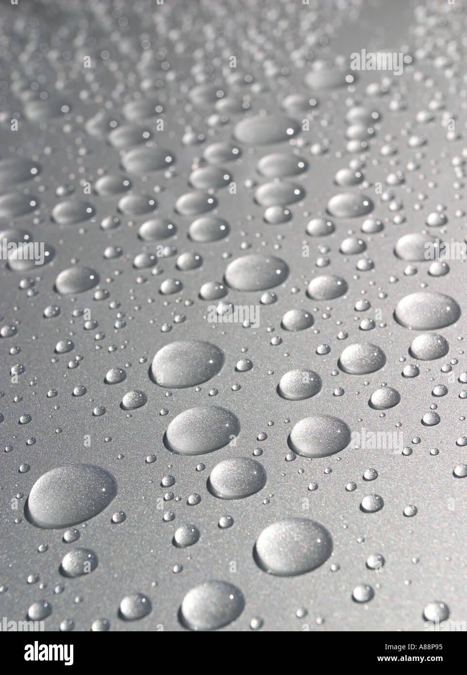 Round water drops on  metal surface Stock Photo