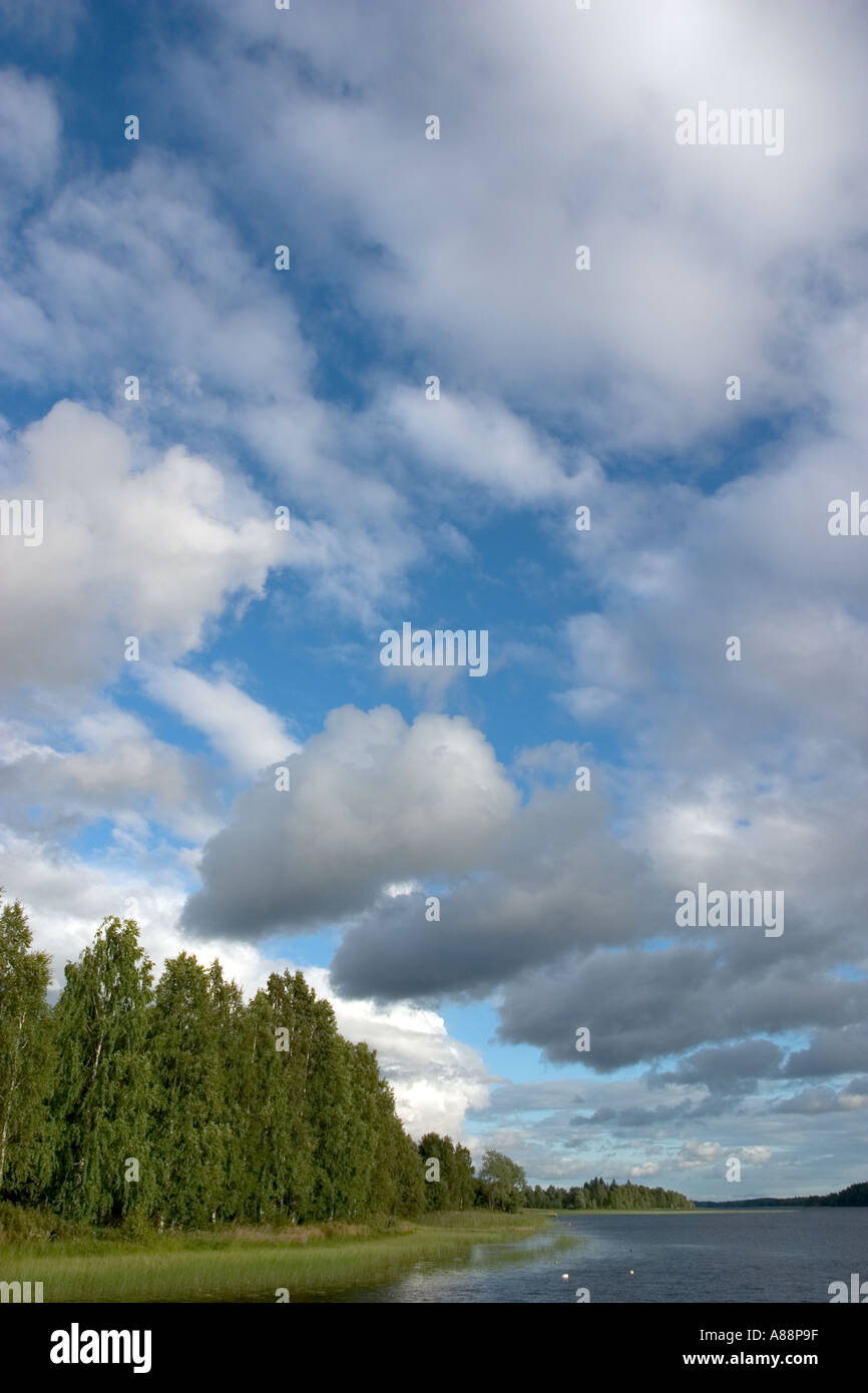 Scene of Finnish lake and clouds in blue sky , Finland Stock Photo - Alamy