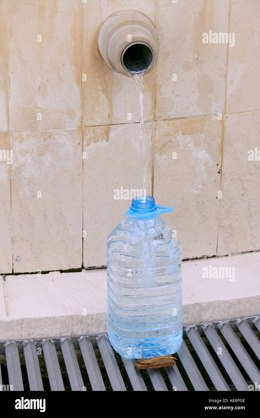 collecting spring water at the Luso spring, Luso, Portugal Stock Photo