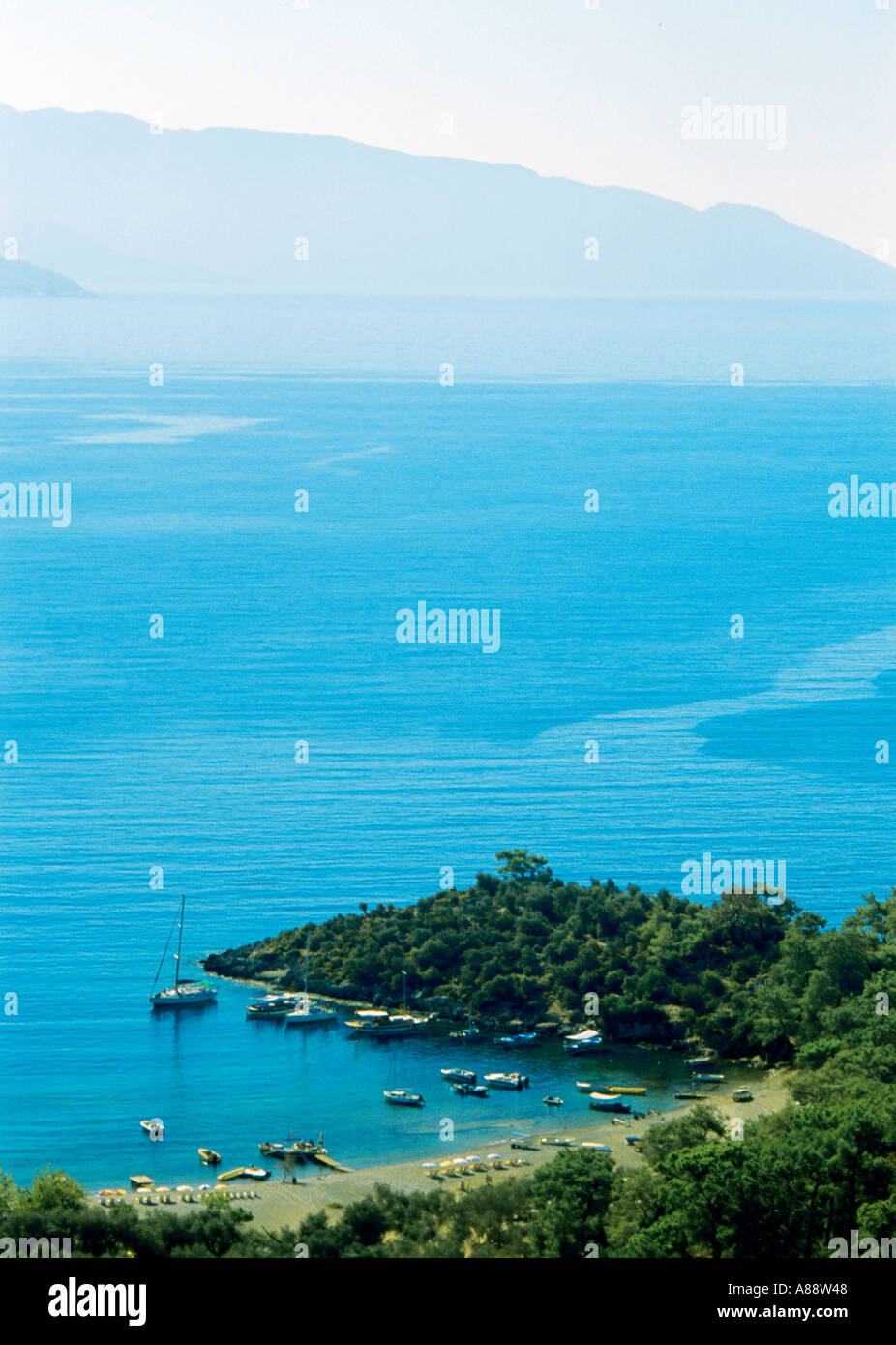 boats beach and bay near Oludeniz and St Nicholas island Stock Photo