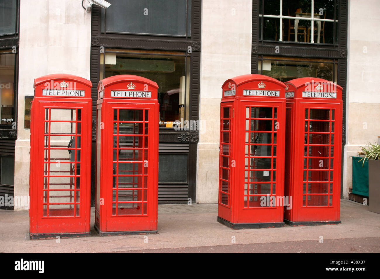 Four Red Telephone Boxes in London Stock Photo Alamy