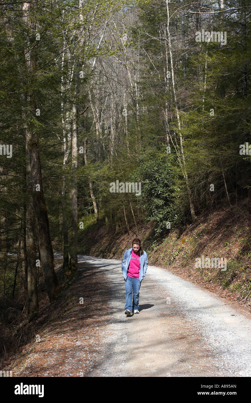 Happy teen walking alone forest hi-res stock photography and images - Alamy