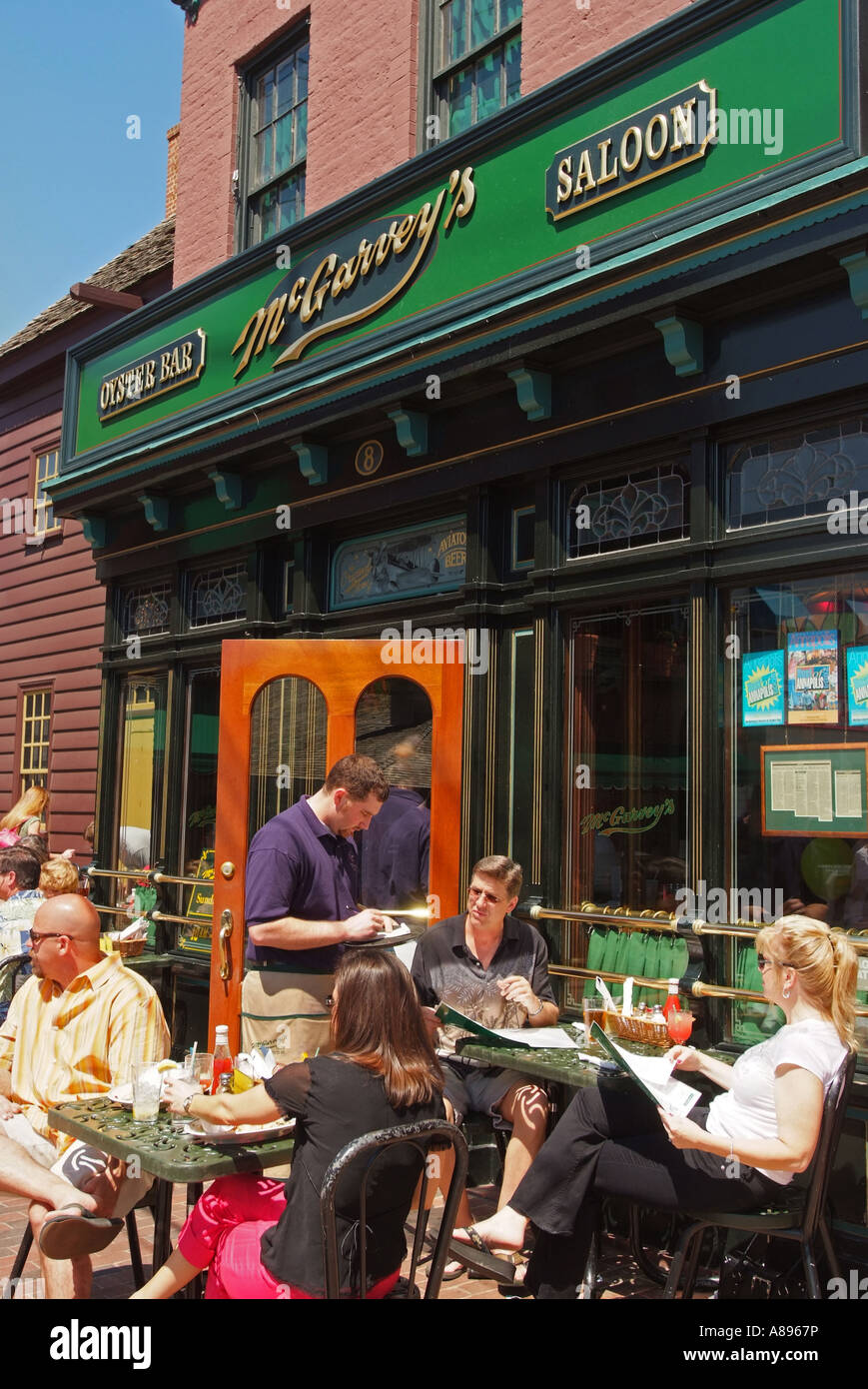 Exterior and outdoor dining at McGarvey s Saloon and Oyster Bar Annapolis MD Stock Photo