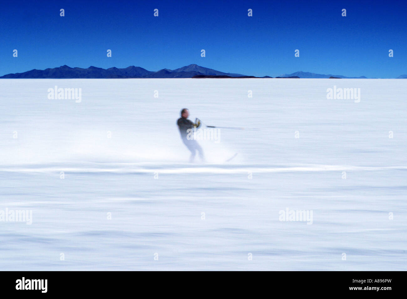 Man Speeding across the water on a wide open space Stock Photo - Alamy