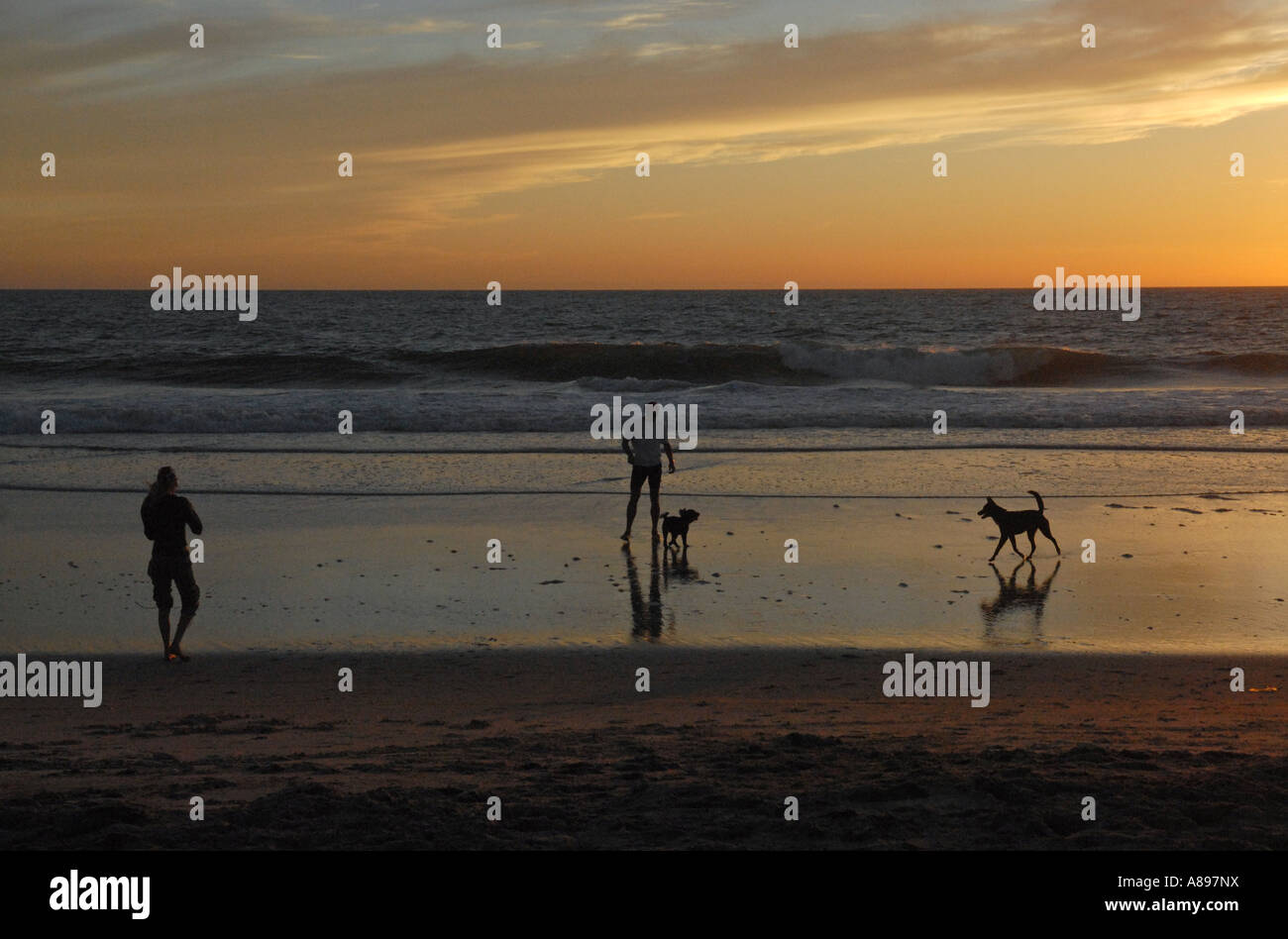 Beautiful sunset at the beach Stock Photo - Alamy