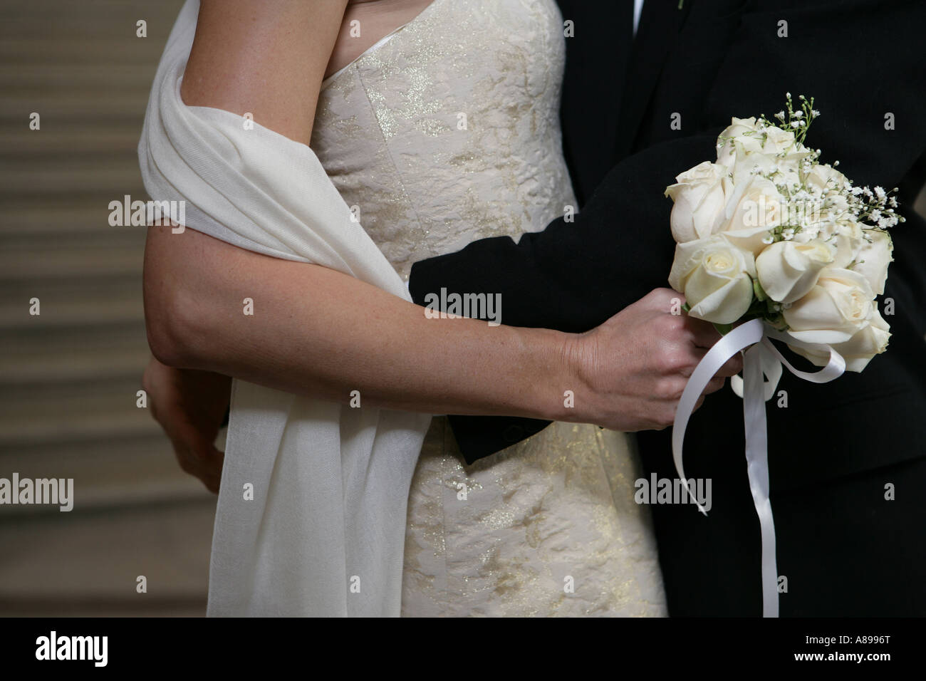 Married couple embracing each other Stock Photo - Alamy