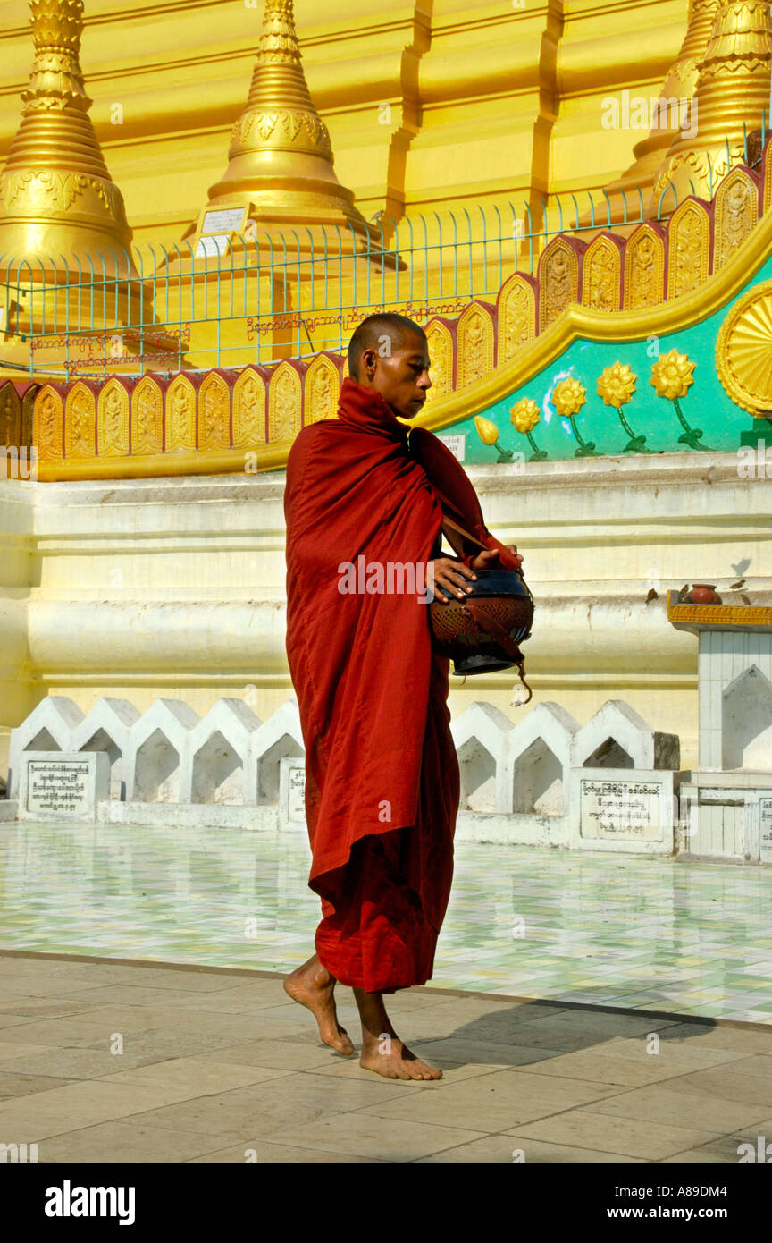 Buddhist monk in walking meditation at golden stupa of Shwemandaw Pagoda  Bago Burma Stock Photo - Alamy