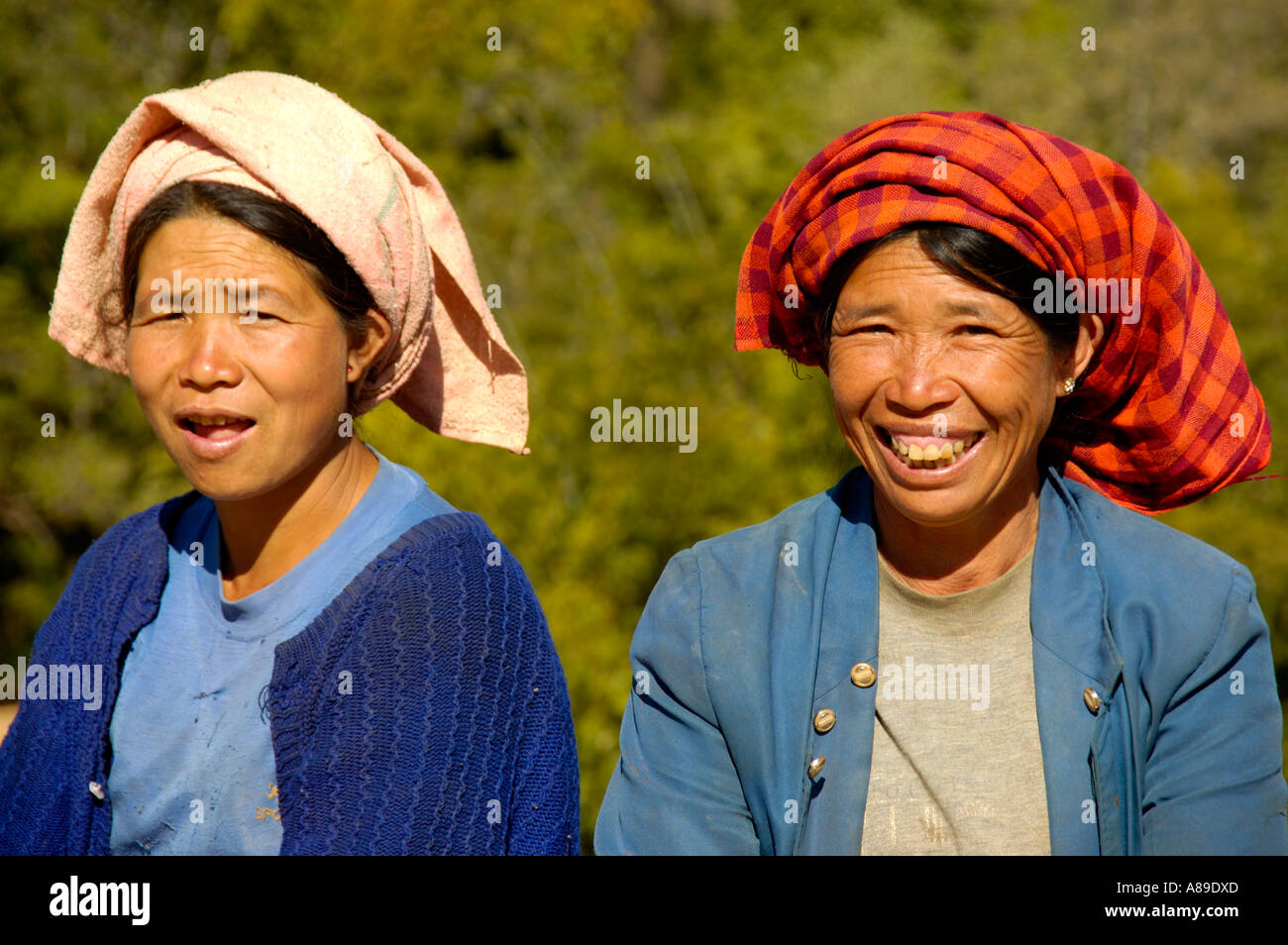 Portrait two Burmese women in traditional dress of Palaung smile