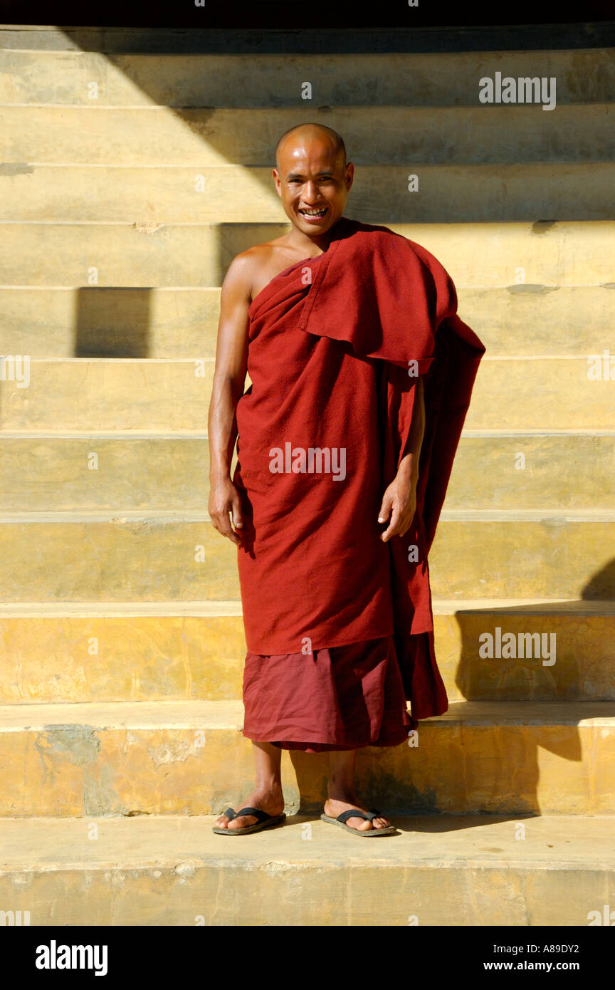 Portrait Buddhist monk in red robe smiles Yasakyi Shan State Burma Stock Photo