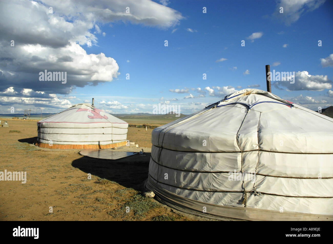 Yurts ger in wide open steppe Bayangobi Mongolia Stock Photo