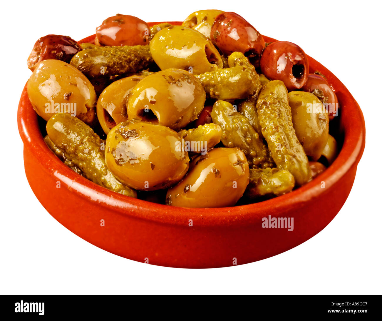 OLIVE AND PICKLE TAPAS ON WHITE Stock Photo